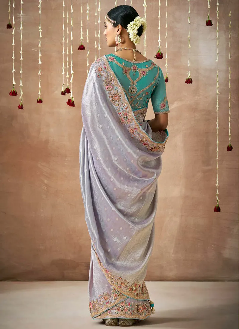 Lavender And Teal Multi Embroidery Tissue Silk Saree